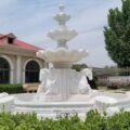 white marble fountain with carved horse sculpture in pure marble