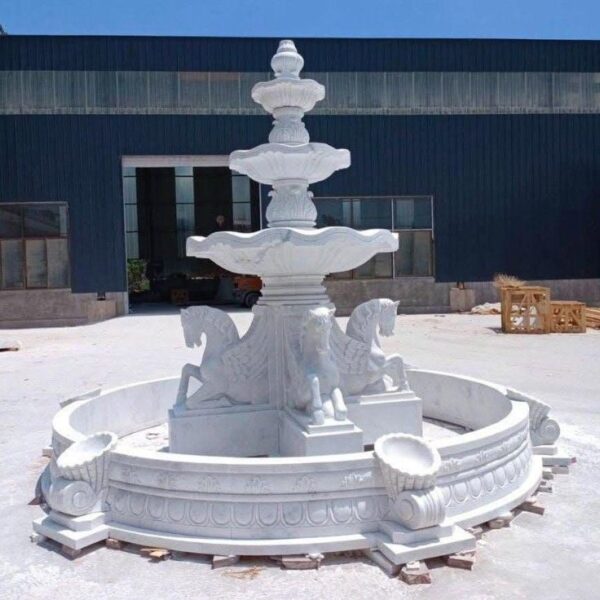 white marble fountain with horse sculpture
